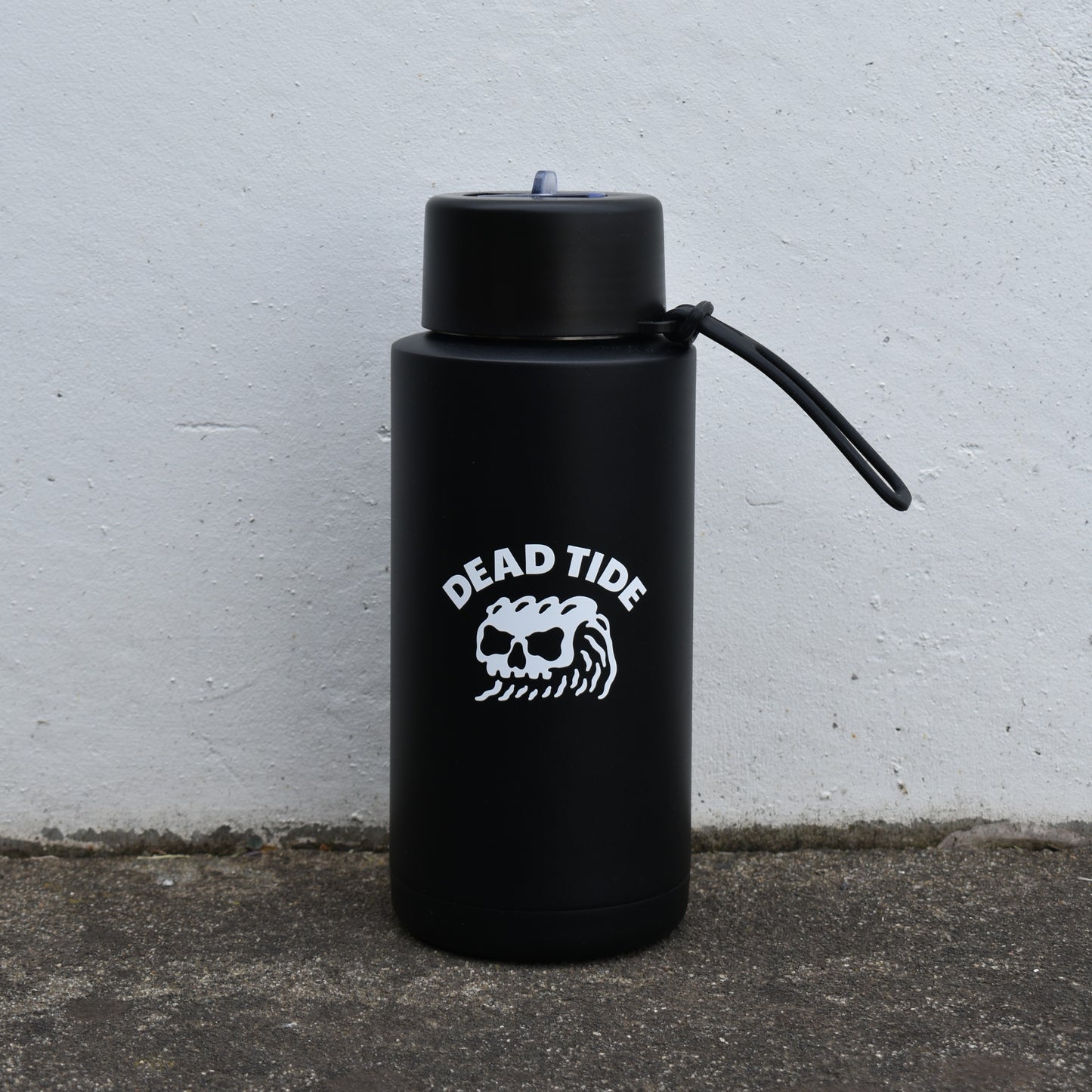 Black insulated water bottle with skull wave Dead Tide logo – alternative fitness accessory